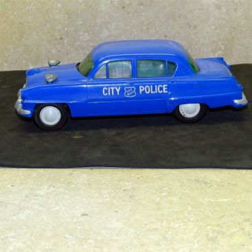 Vintage Plastic 1954 Plymouth City Police Dealer Promo Car, Friction Main Image Vintage Plastic 1954 Plymouth City Police Dealer Promo Car, Friction Main Image