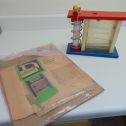 Vintage Doepke Up See Down Marble lift toy-Fair Condition-with box & accessories Main Image