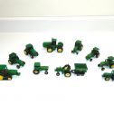 Vintage 12 John Deere Gen..II Historical Tractors and trailers-Ertl Diecast Lot Main Image